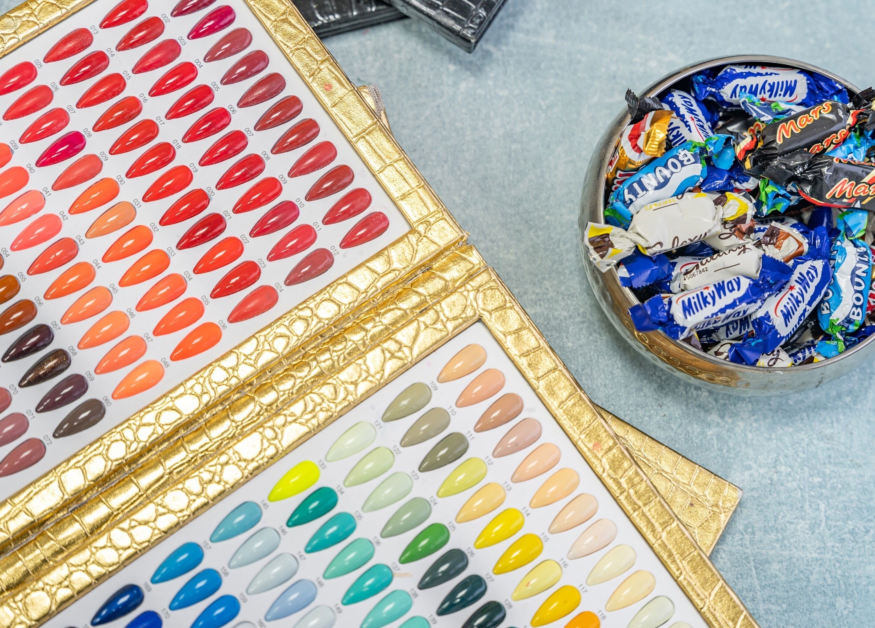 Nail polish palette with sweets at Chocolate & Nails - Ealing Broadway in London, England, GB.