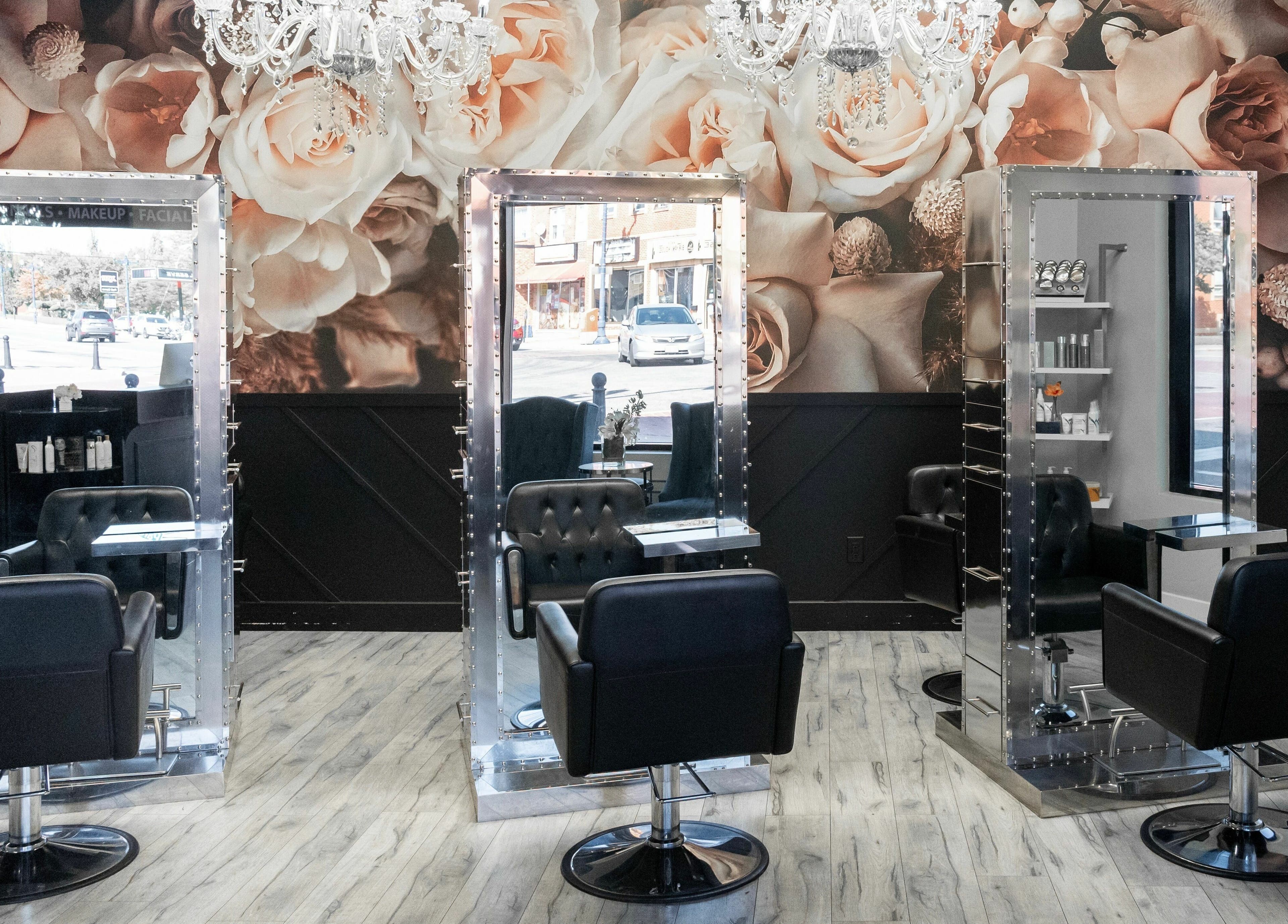 Elegant styling chairs and mirrors at Elysian Beauty Bar Inc, Windsor, Ontario, CA, showcasing luxury decor.