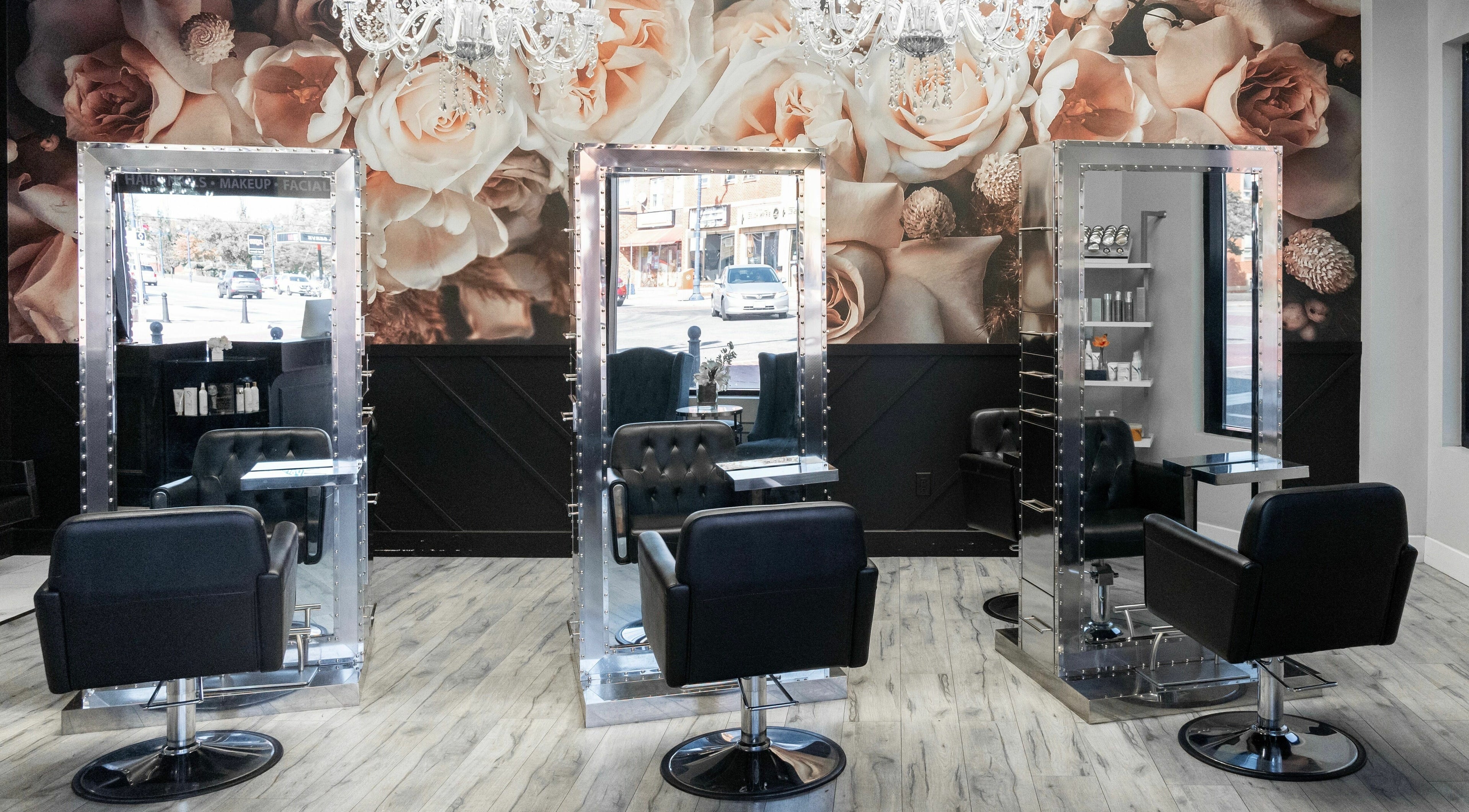 Elegant styling chairs and mirrors at Elysian Beauty Bar Inc, Windsor, Ontario, CA, showcasing luxury decor.