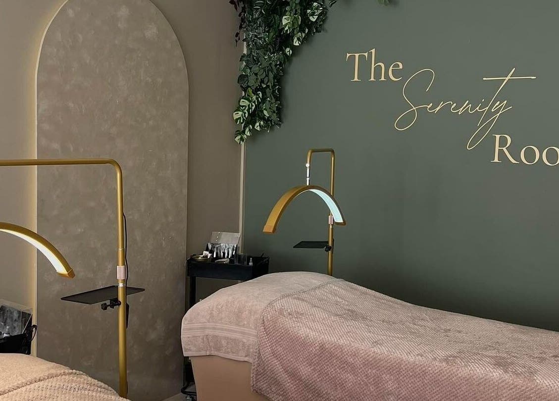 Relaxing massage room at The Serenity Rooms in Emsworth, England, GB with cozy beds and elegant decor.