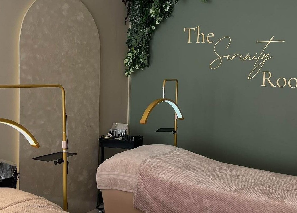 Relaxing massage room at The Serenity Rooms in Emsworth, England, GB with cozy beds and elegant decor.