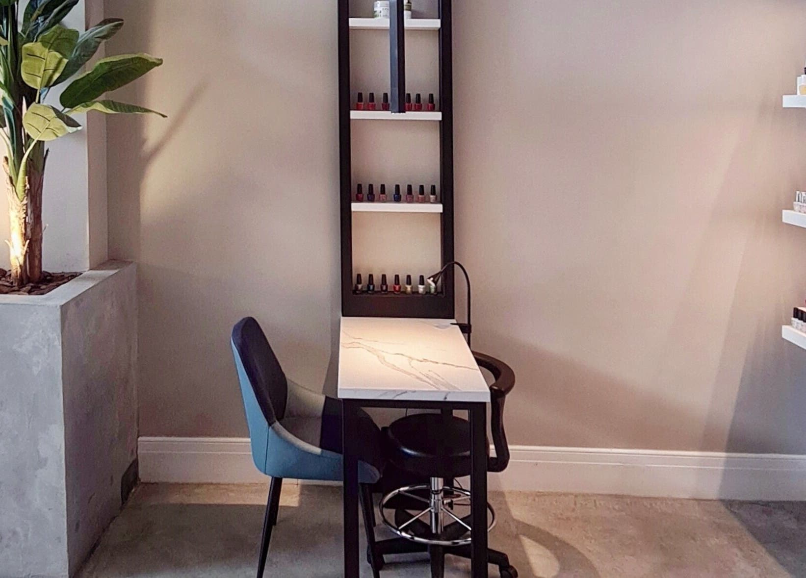 Elegant nail station at Circle Nail Bar, Riyadh, Riyadh Province, SA, featuring a sleek manicure setup.