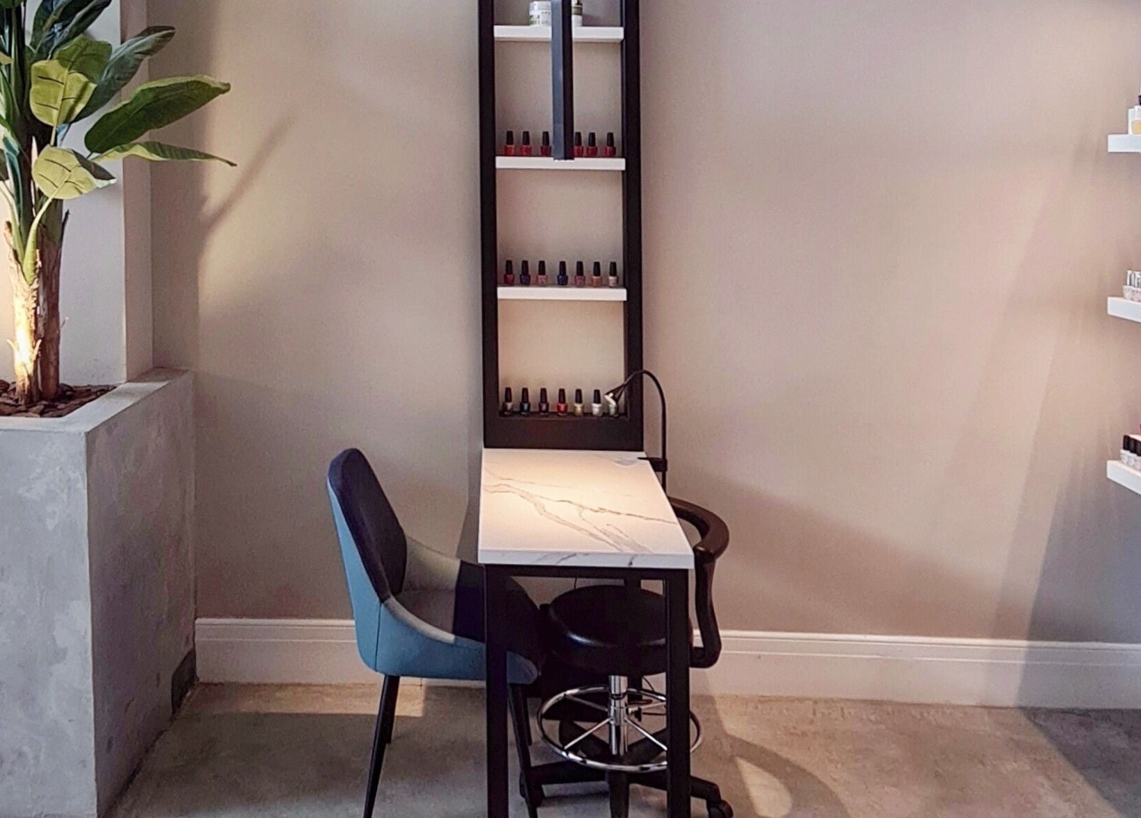 Elegant nail station at Circle Nail Bar, Riyadh, Riyadh Province, SA, featuring a sleek manicure setup.