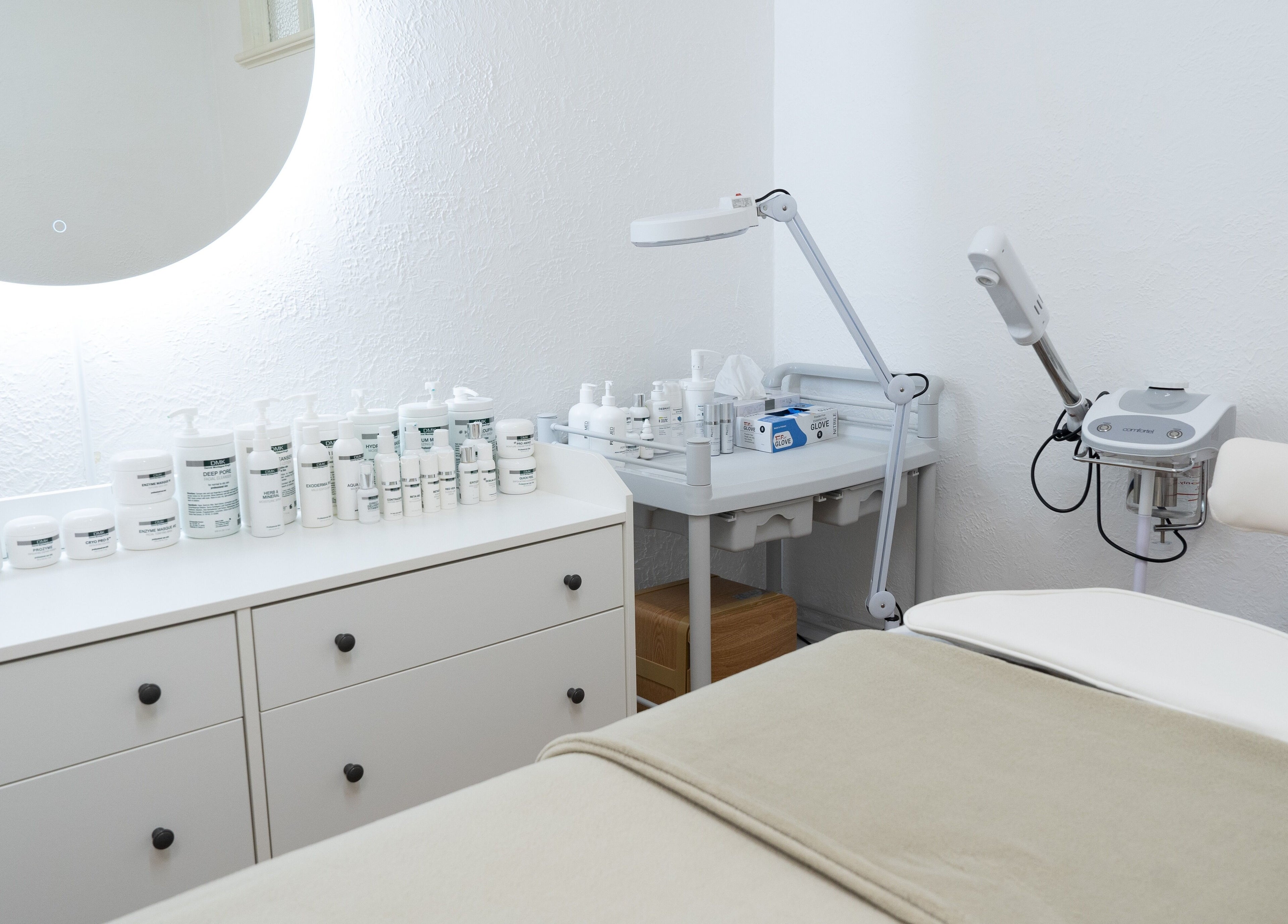 Treatment room at Dermission Skin And Rejuvenation in Bentleigh, Victoria, AU with skincare products and equipment.