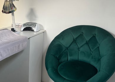 Elegant green chair and nail table at Balanced Within By Jade, Bristol, England, GB.