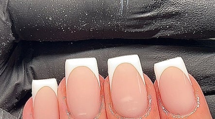 Stylish French manicure nails by Ormofia in Sunderland, England, GB, showcasing sleek design and precision.