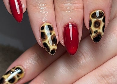 Leopard print and red manicure at Ormofia, Sunderland, England, GB.