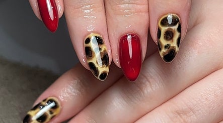 Leopard print and red manicure at Ormofia, Sunderland, England, GB.