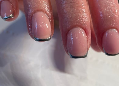 Elegant nail art at Divine Beauty & Aesthetics, Lichfield, England, GB showcasing glossy manicure.