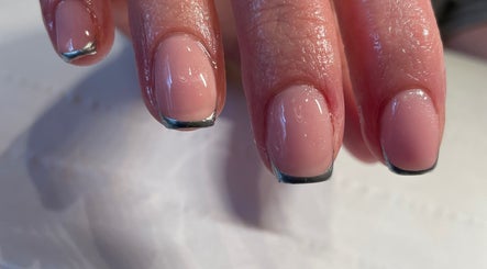 Elegant nail art at Divine Beauty & Aesthetics, Lichfield, England, GB showcasing glossy manicure.