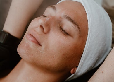 Relaxing facial treatment at Divine Beauty & Aesthetics, Lichfield, England, GB. Achieve a serene, radiant look.