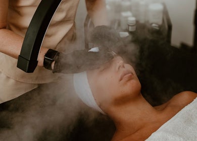 Steam facial treatment at Divine Beauty & Aesthetics in Lichfield, England, GB promoting relaxation and skincare.