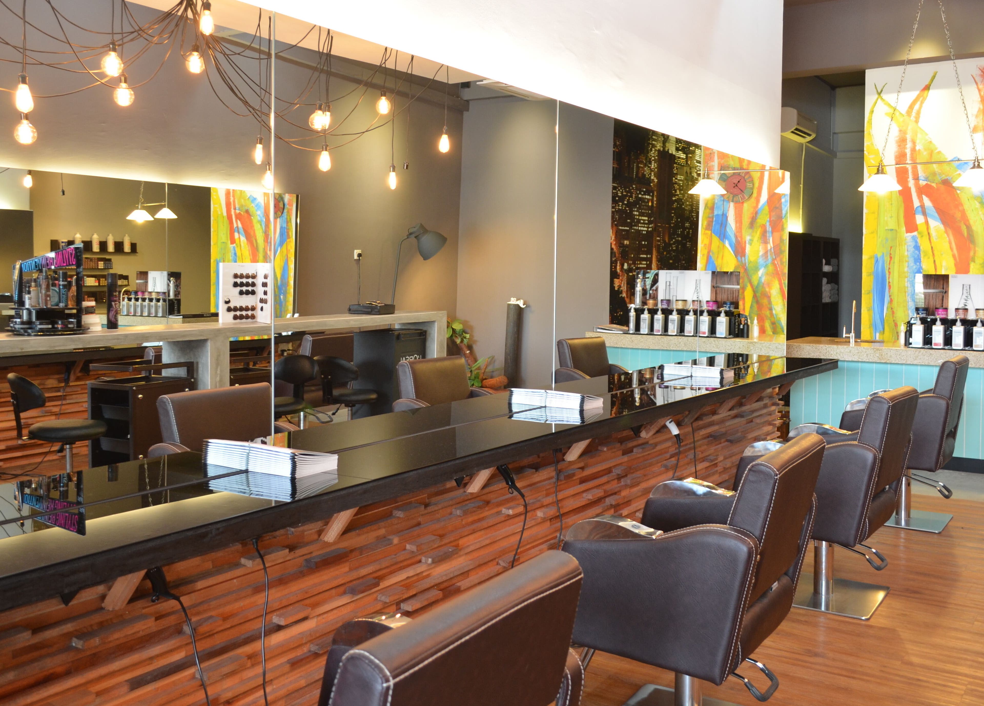 Interior of Trove Hairdressing in Cheras, Selangor, MY, featuring stylish salon chairs and vibrant decor.