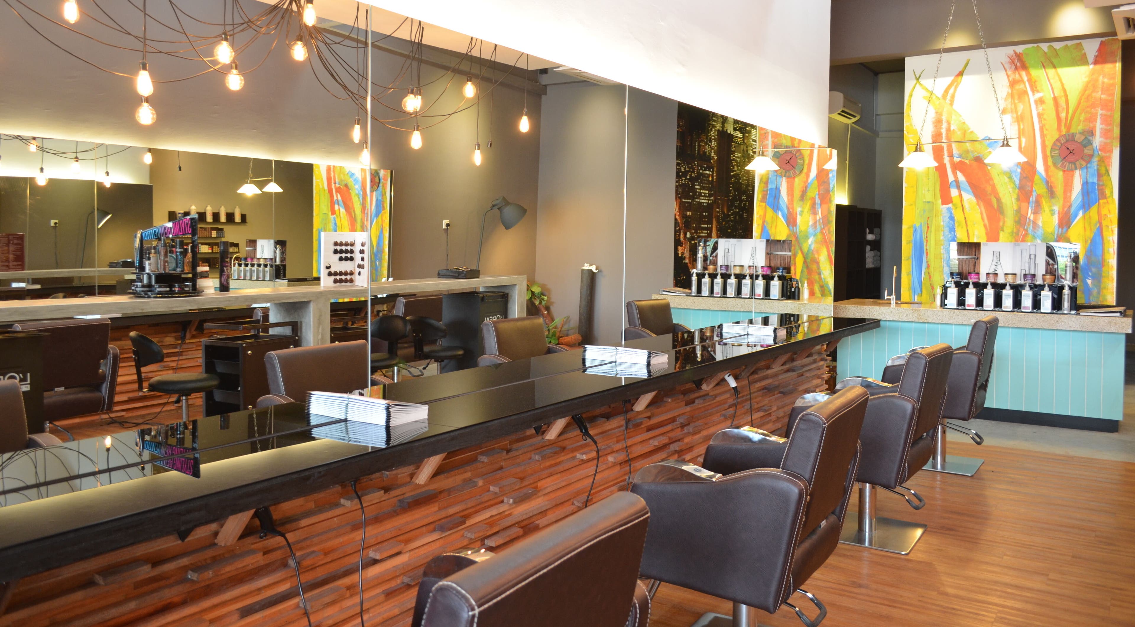 Interior of Trove Hairdressing in Cheras, Selangor, MY, featuring stylish salon chairs and vibrant decor.