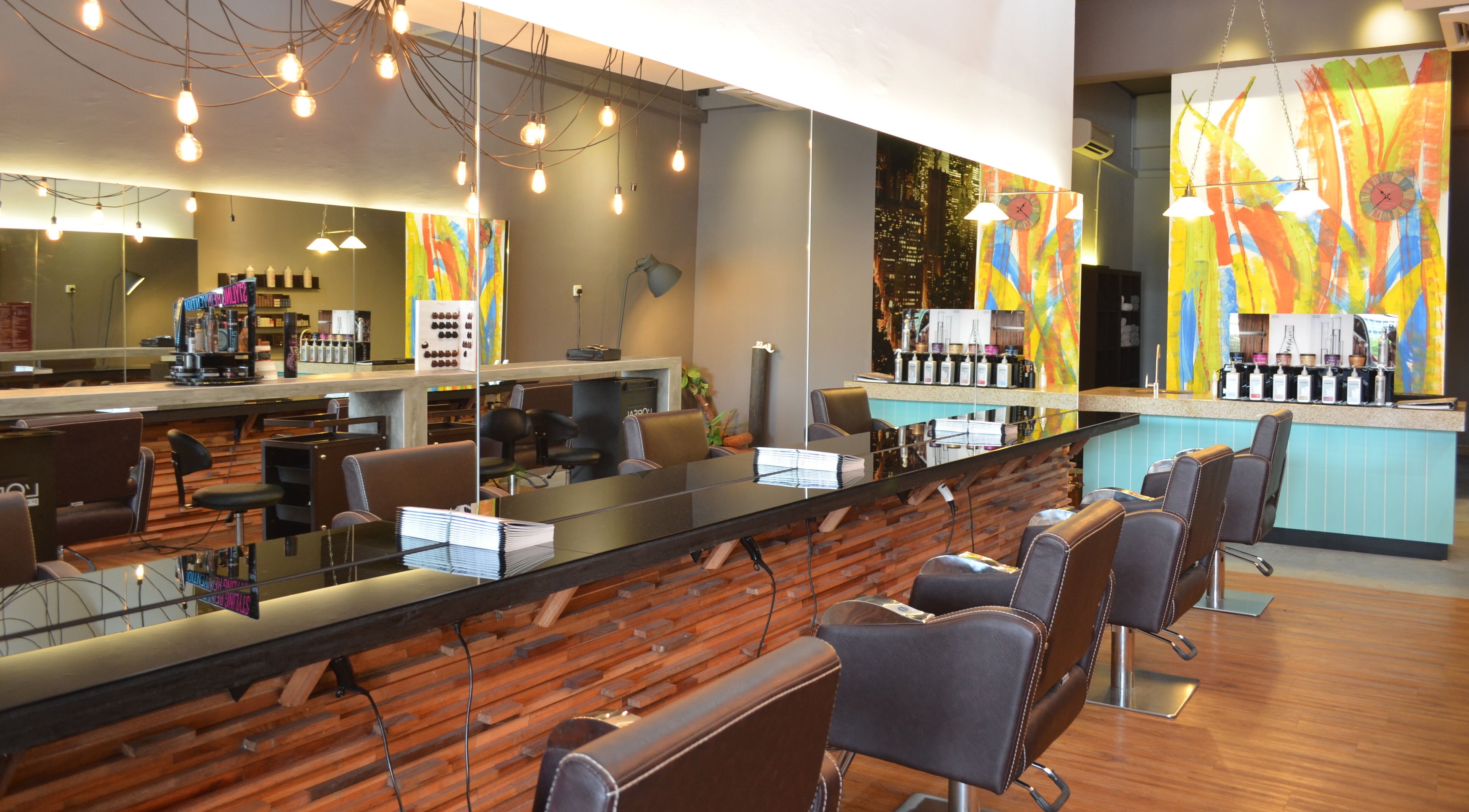 Interior of Trove Hairdressing in Cheras, Selangor, MY, featuring stylish salon chairs and vibrant decor.