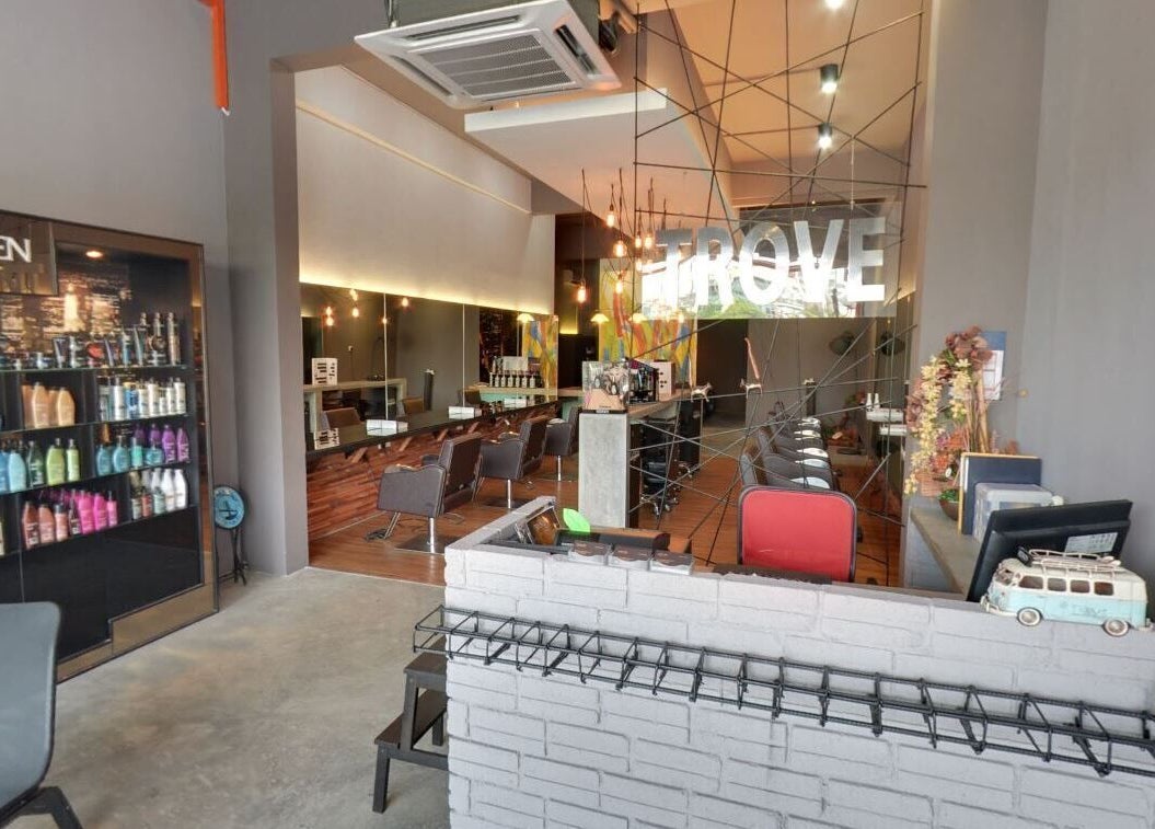 Interior of Trove Hairdressing in Cheras, Selangor, MY featuring modern styling stations and product displays.