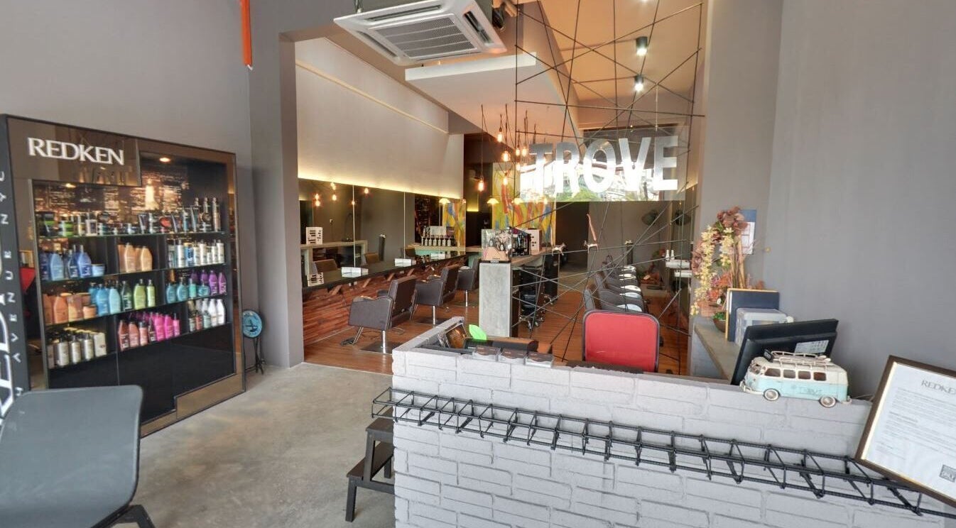 Interior of Trove Hairdressing in Cheras, Selangor, MY featuring modern styling stations and product displays.