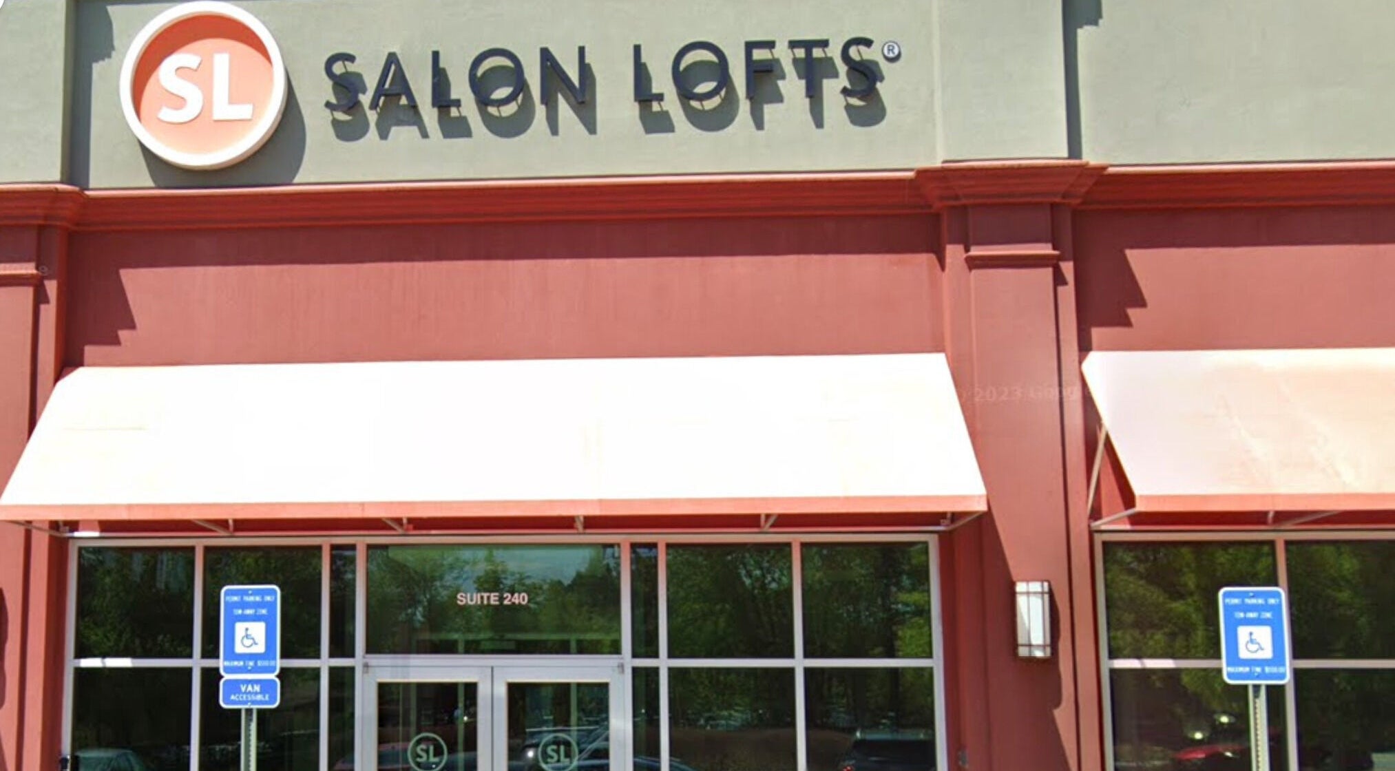 Front facade of Hardi Barbershop at Salon Lofts, Roswell, Georgia, US, with accessible parking.