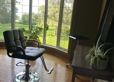Relaxing salon chair at SEW Hair Extensions with a garden view, Alberta, Alberta, CA.
