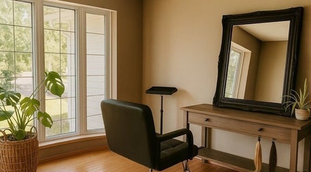 Calm, sunlit styling area at SEW Hair Extensions, Alberta, Alberta, CA with plush chair and elegant decor.