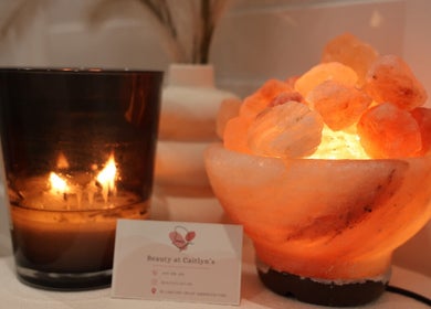 Peaceful ambiance at Beauty at Caitlyn’s, Harrington Park with candle and salt lamp decor.