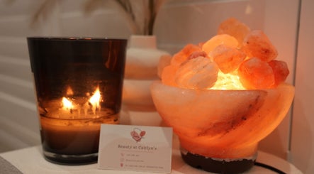 Peaceful ambiance at Beauty at Caitlyn’s, Harrington Park with candle and salt lamp decor.