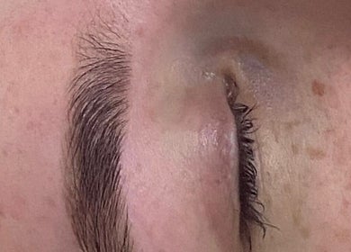 Close-up of expertly groomed eyebrow at N1 Beauty Base, London, England, GB.