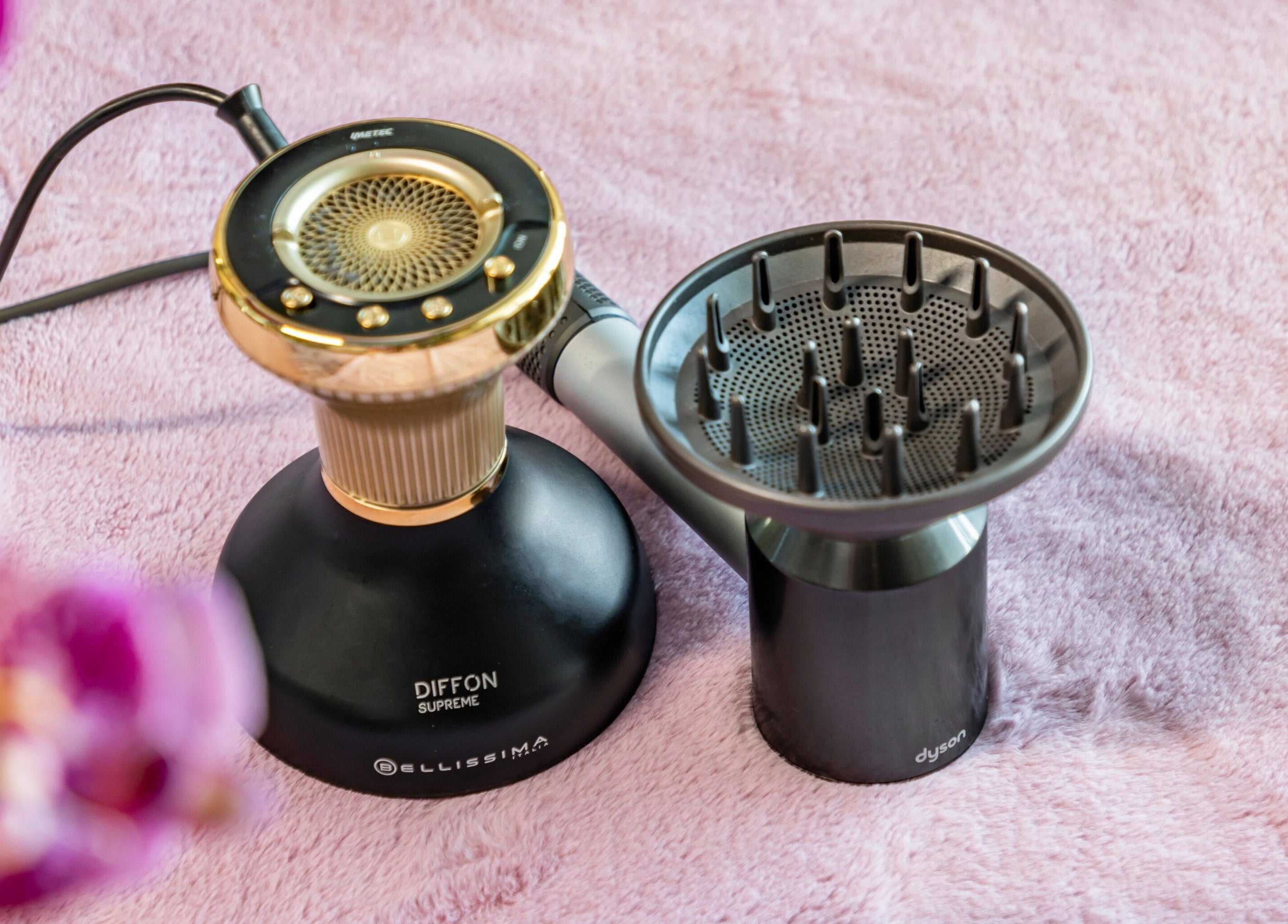 Elegant hair diffuser at Curl Power by Elaine, London, England, GB, on a plush pink towel.