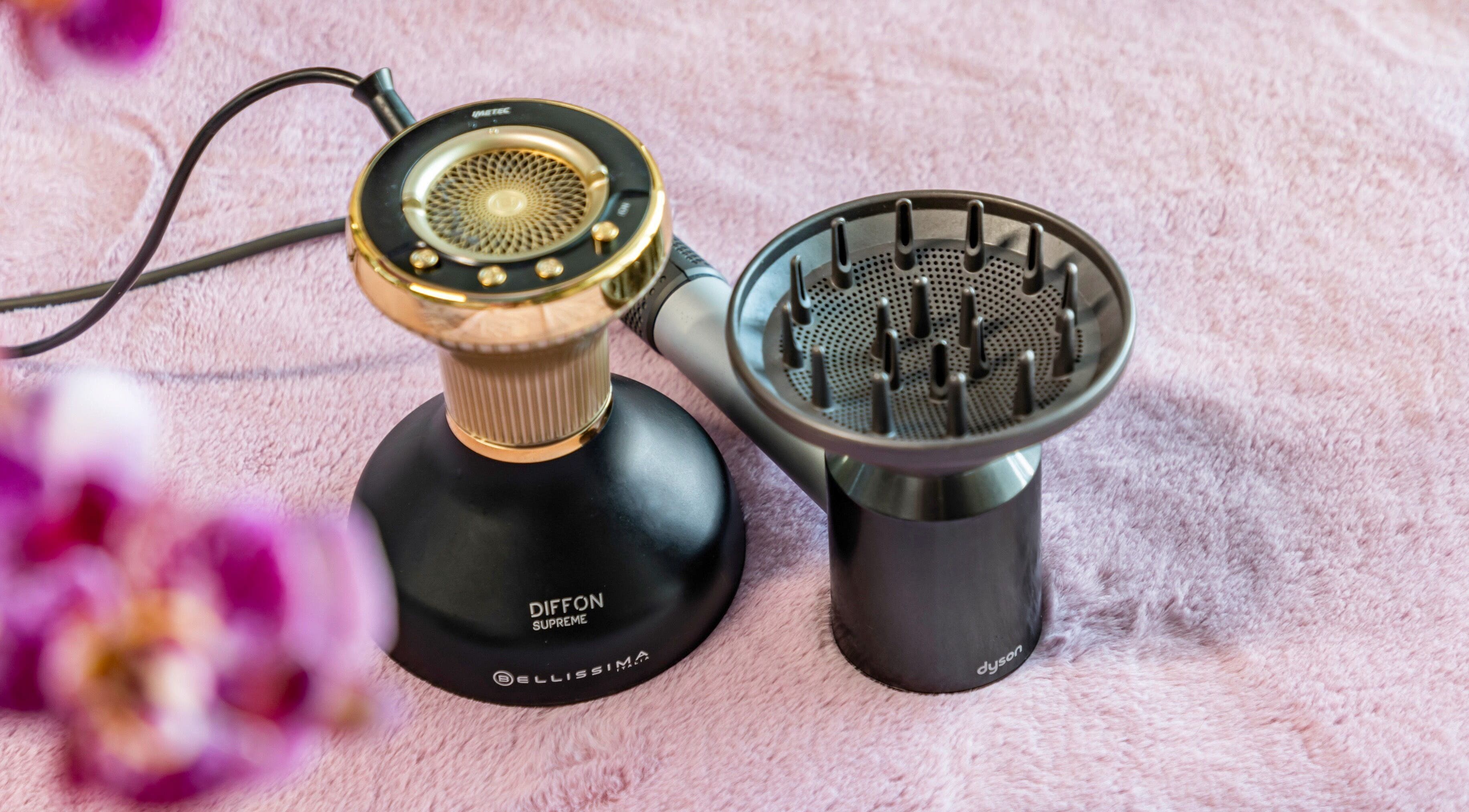 Elegant hair diffuser at Curl Power by Elaine, London, England, GB, on a plush pink towel.