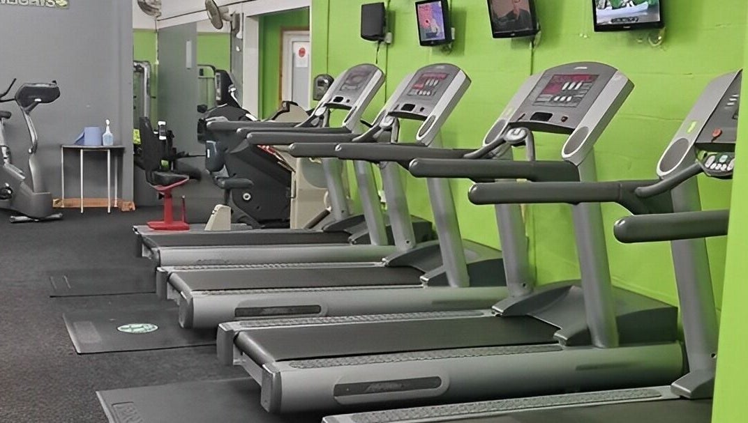 Row of treadmills at Gn Fitness, Great Yarmouth, England, GB, ideal for cardio and fitness enthusiasts.