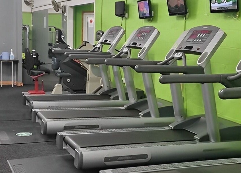 Row of treadmills at Gn Fitness, Great Yarmouth, England, GB, ideal for cardio and fitness enthusiasts.