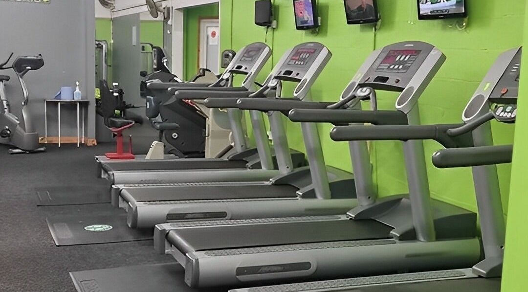 Row of treadmills at Gn Fitness, Great Yarmouth, England, GB, ideal for cardio and fitness enthusiasts.