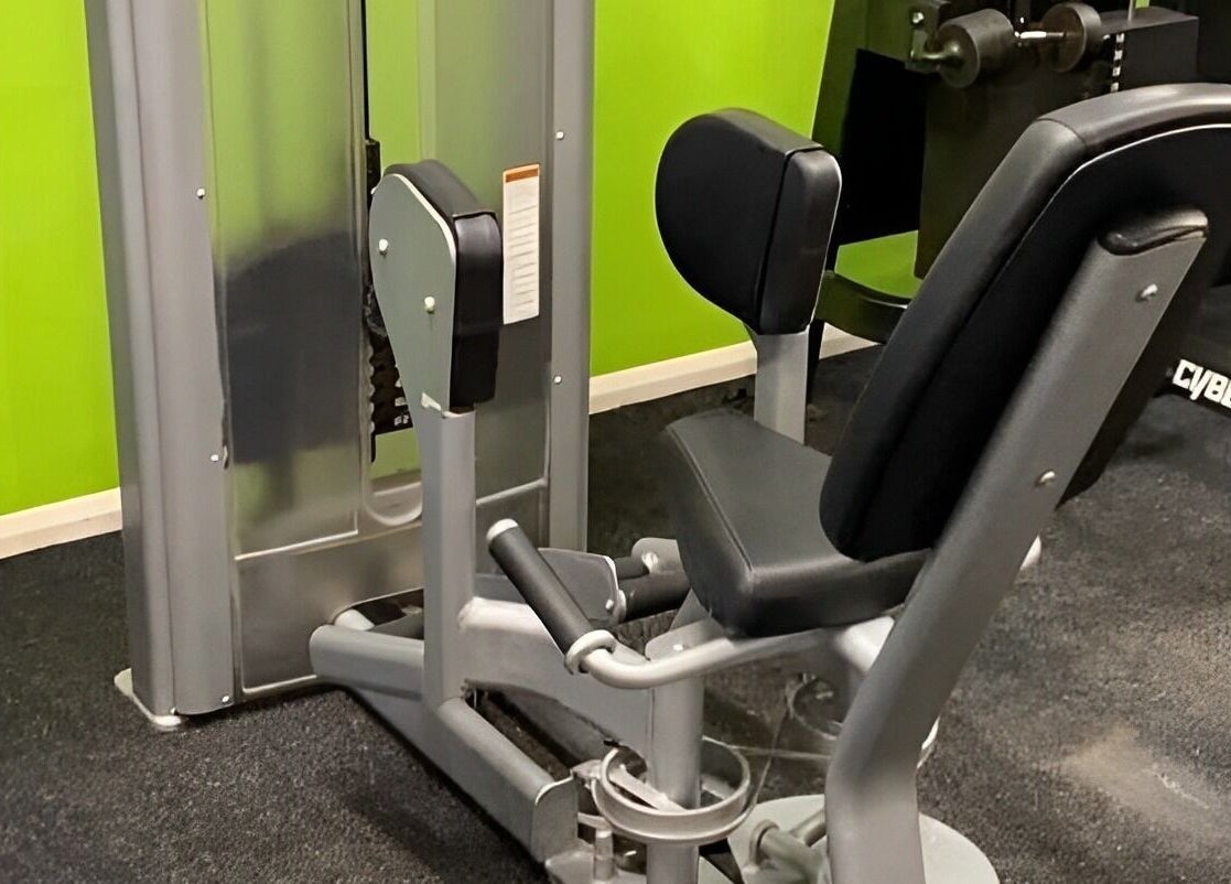 Exercise machine at Gn Fitness, Great Yarmouth, England, GB, with green walls and sleek gym equipment.