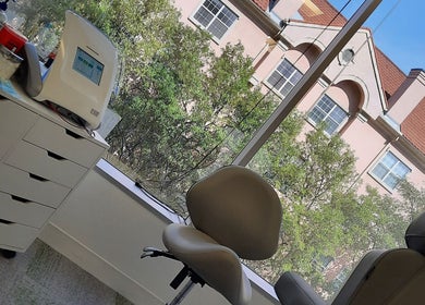 Modern electrolysis room at NuYou Hair Removal Solutions in Dallas, Texas, US with a serene outdoor view.