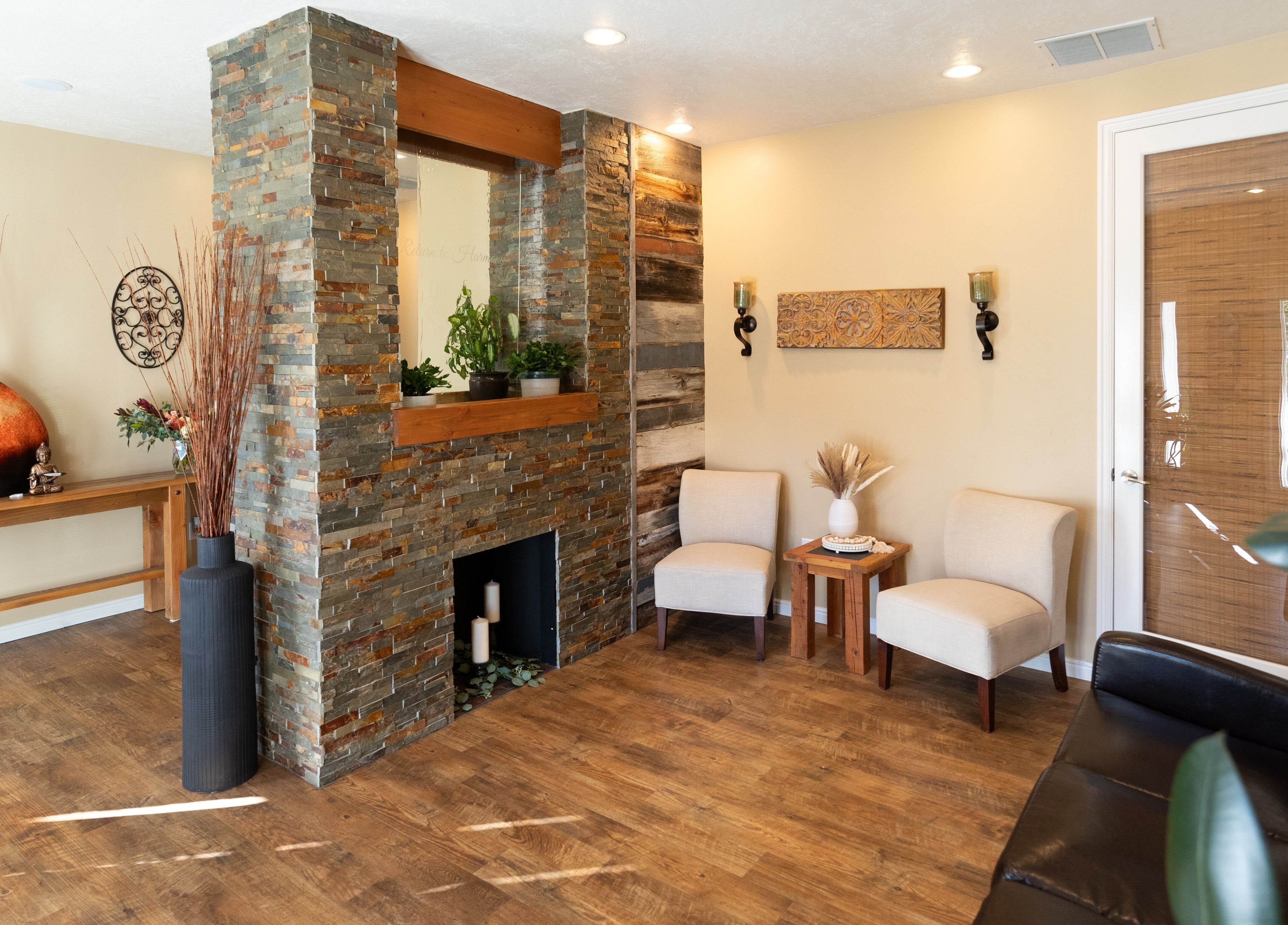 Inviting lounge area at Return To Harmony, Draper, Utah, US with cozy seating and decorative elements.
