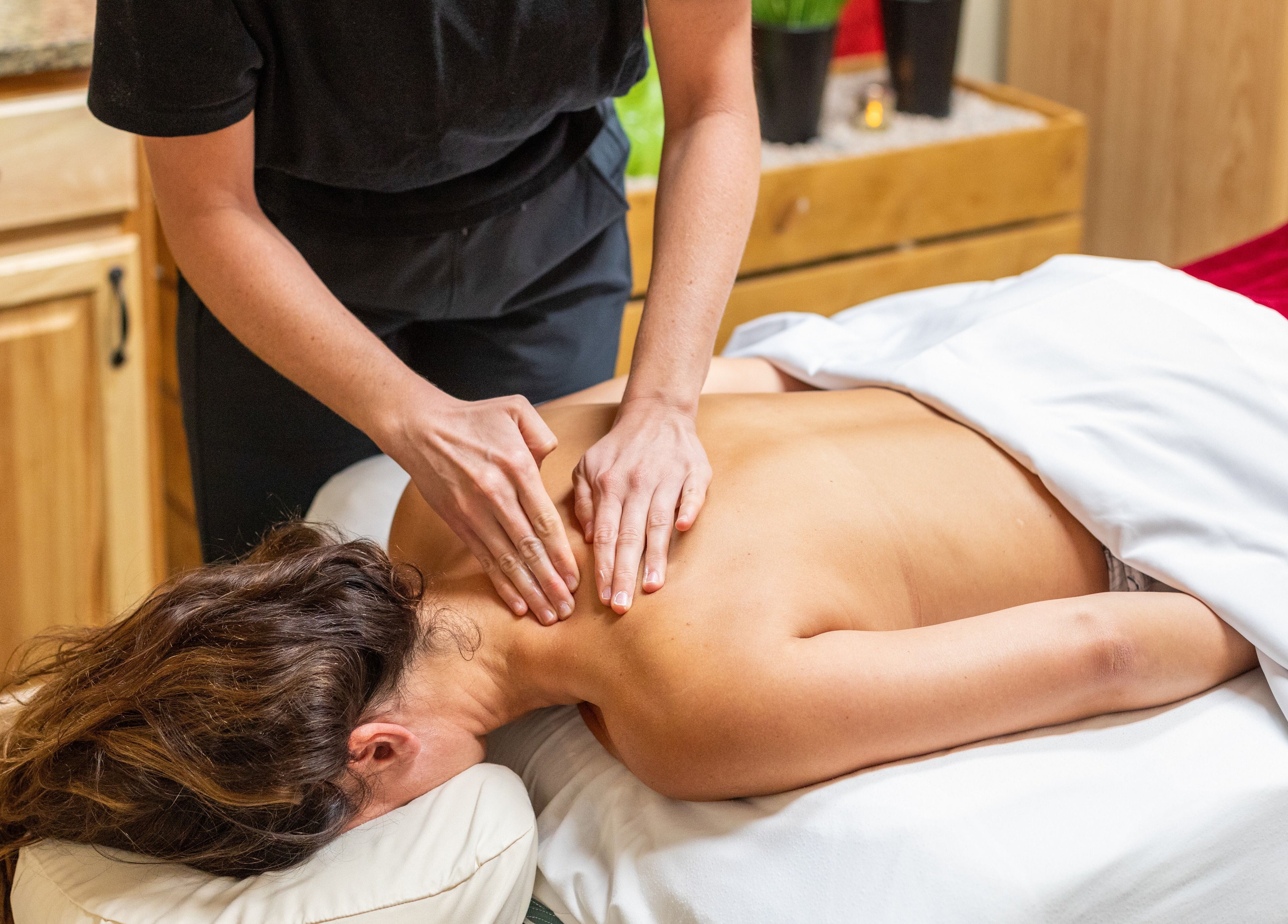 Relaxing massage session at Return To Harmony in Draper, Utah, US, providing serene wellness experience.