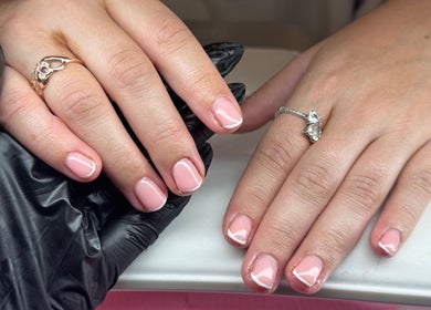 Manicured hands with French tips at LMA Beauty21, Gloucester, England, GB.