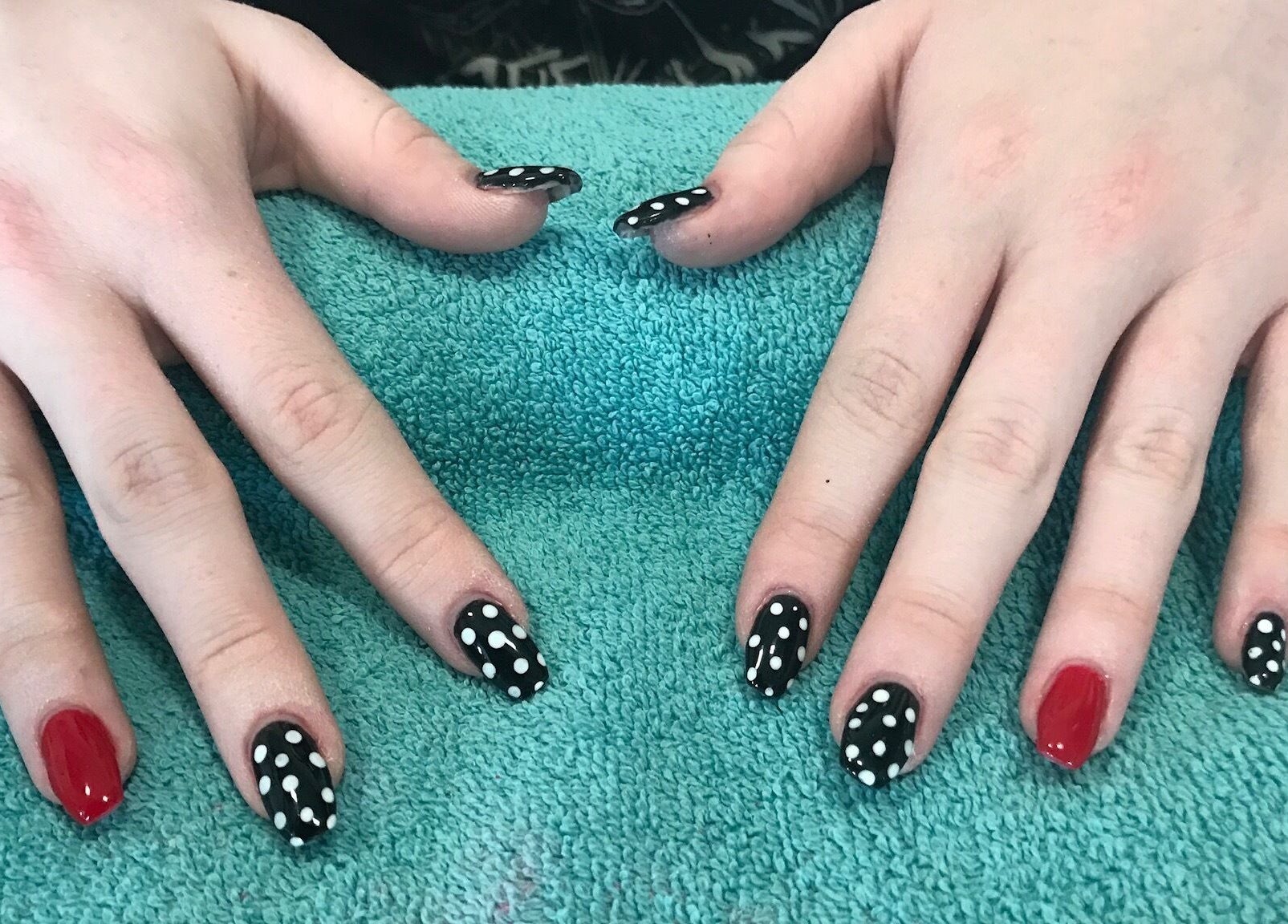 Polka dot and red nail art at Head to Toe Studio, Arvada, Colorado, US.