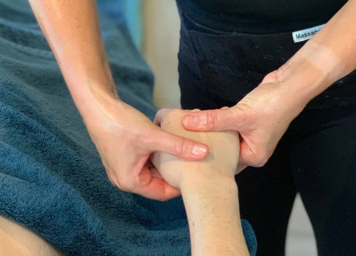 Hand massage therapy at You, Restored (Day Spa & Body Contouring) in Port Kennedy, Western Australia.