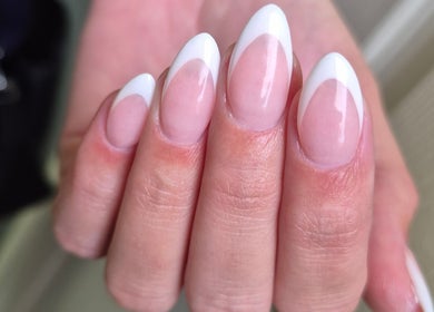 Elegant French manicure by Monè Lake Nail Artist in Mashishing, Mpumalanga, ZA showcasing refined nail art.
