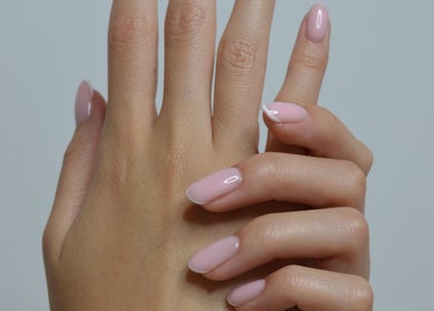 Manicured nails in soft pink at Casa Artistry, Campsie, New South Wales, AU.