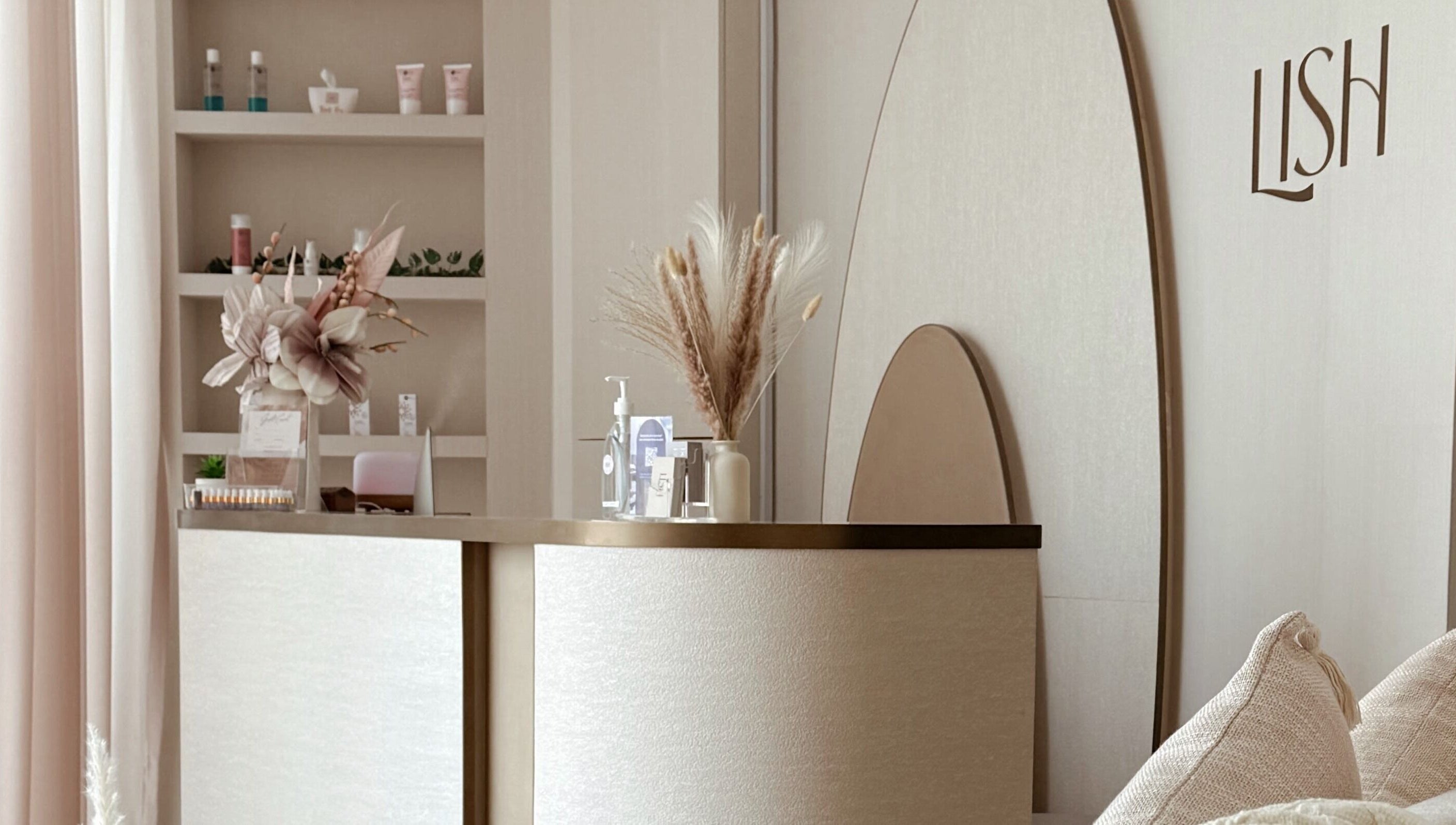 Reception at Lish Beauty Bar - JLT, Dubai, Dubai, AE showcasing modern decor and floral accents.