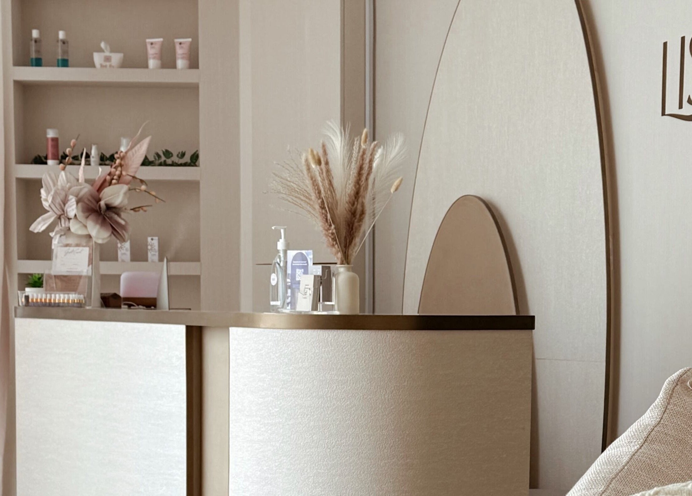 Reception at Lish Beauty Bar - JLT, Dubai, Dubai, AE showcasing modern decor and floral accents.