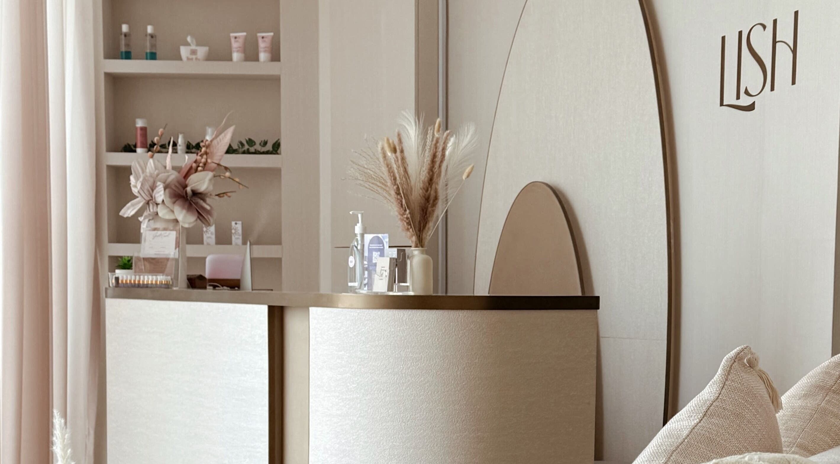 Reception at Lish Beauty Bar - JLT, Dubai, Dubai, AE showcasing modern decor and floral accents.