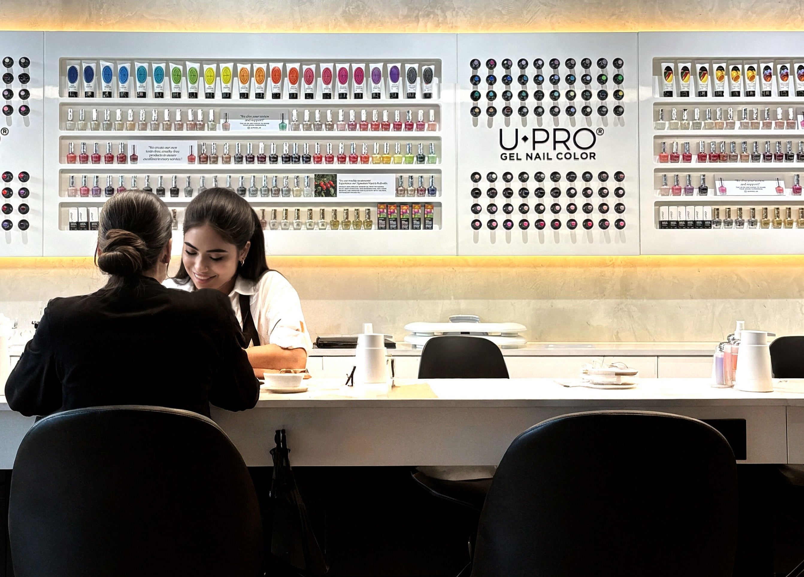 UMARA venue in Miami, Florida, US features an elegant manicure station with vibrant nail polish display.