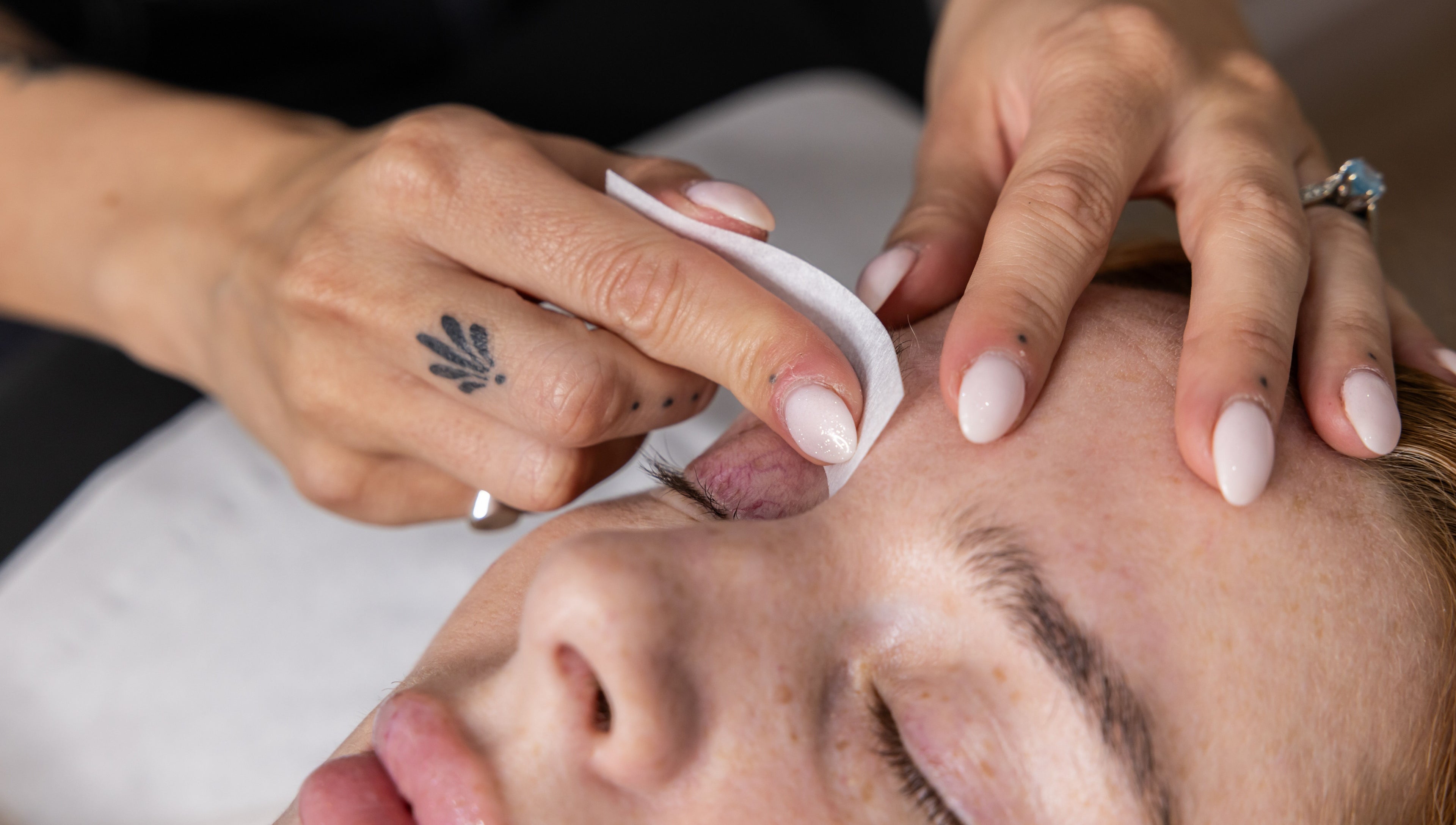 Close-up of eyebrow treatment at Bare Beauty, Edinburgh, Scotland, GB, showcasing expert care and precision.