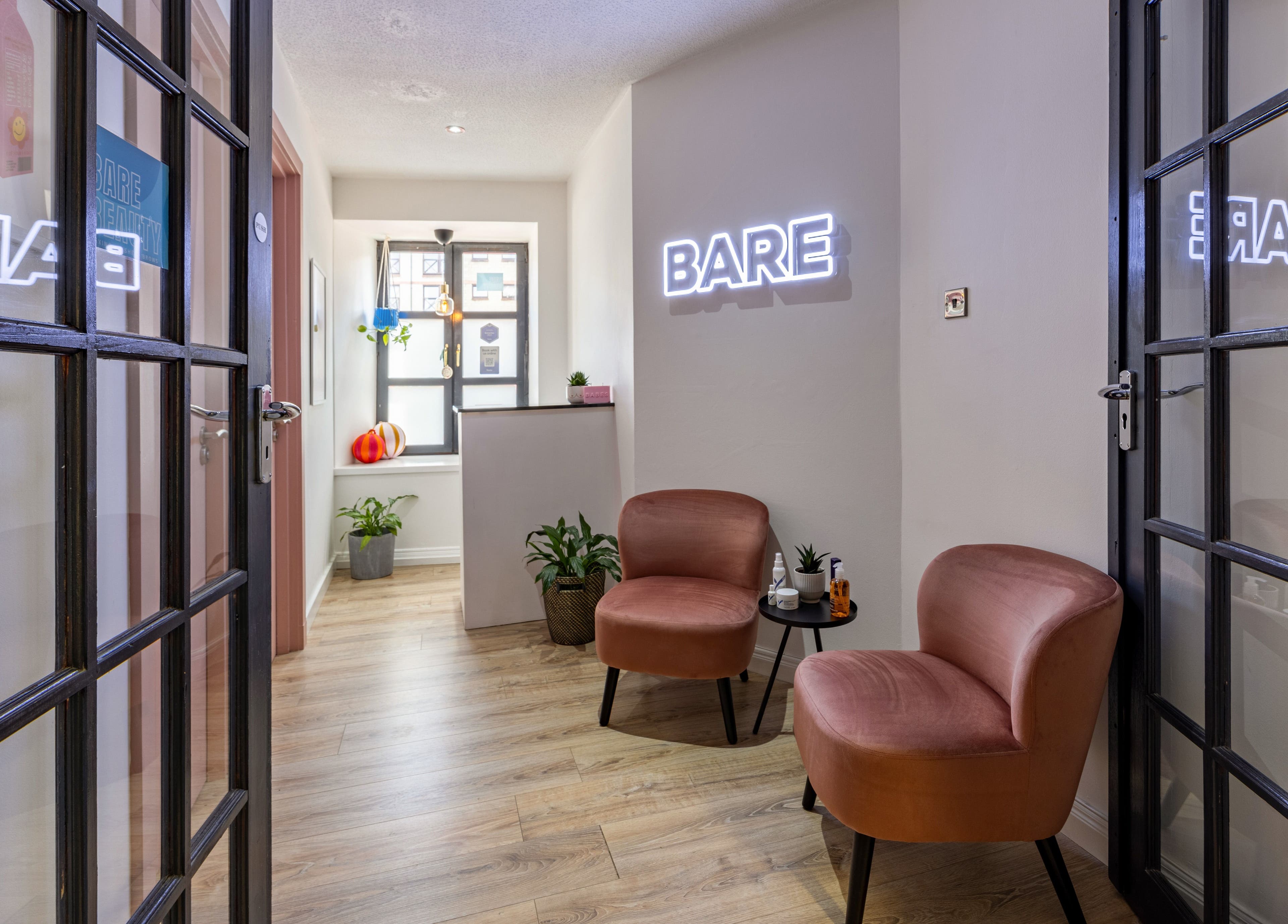 Inviting Bare Beauty entrance with modern decor in Edinburgh, Scotland, GB.