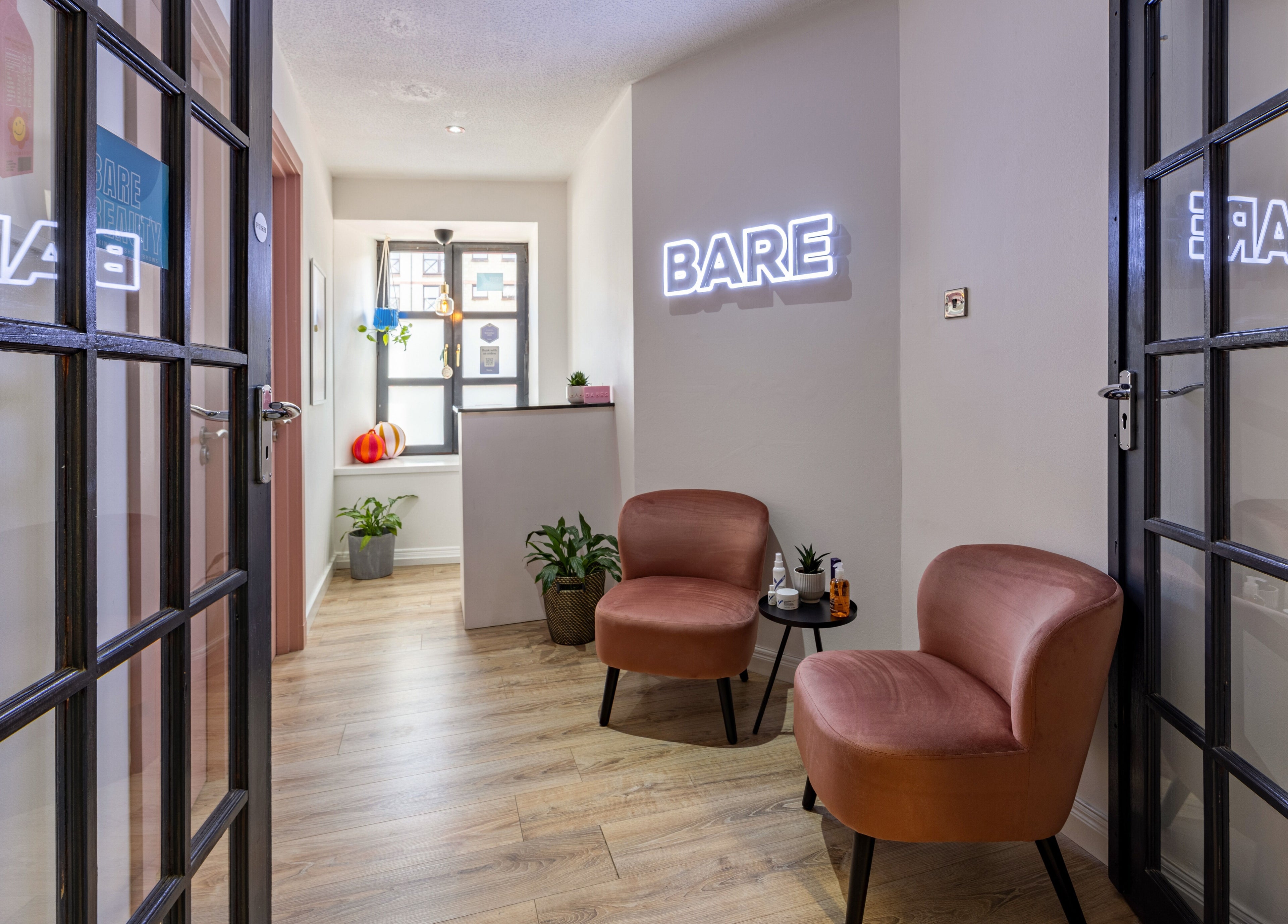 Inviting Bare Beauty entrance with modern decor in Edinburgh, Scotland, GB.