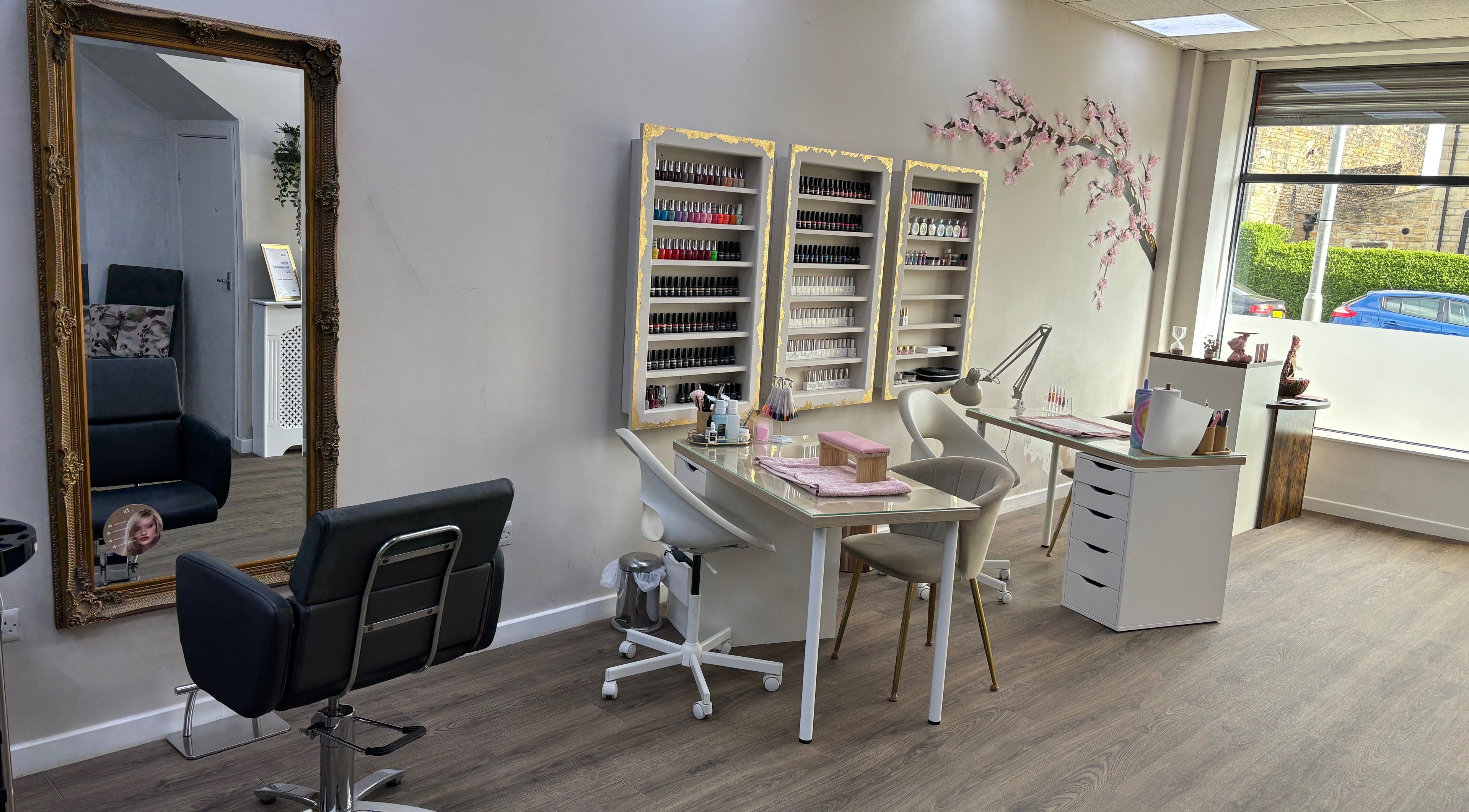 Sophisticated nail bar at Blossom Hair & Beauty in Cleckheaton, England, GB with stylish seating and decor.