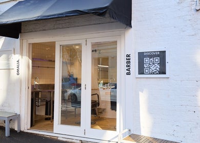 Front view of OMALIA. SURRY HILLS salon entrance in Surry Hills, New South Wales, AU. Stylish and modern design.